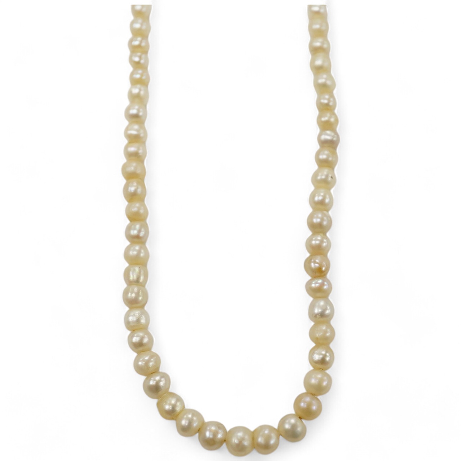 An early 20th century single strand graduated seed pearl necklace, with 9ct barrel clasp, 38cm. Condition - fair